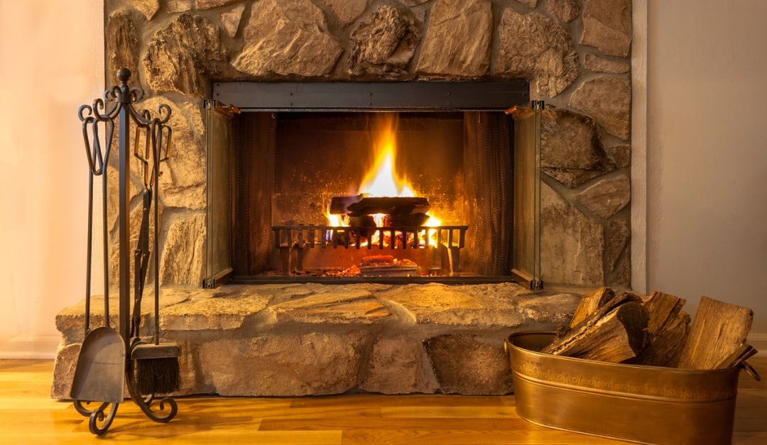//www.cshelimeet.com/wp-content/uploads/2018/11/stone-fireplace-with-logs-burning-in-a-residential-home-picture-id1166435537.jpg